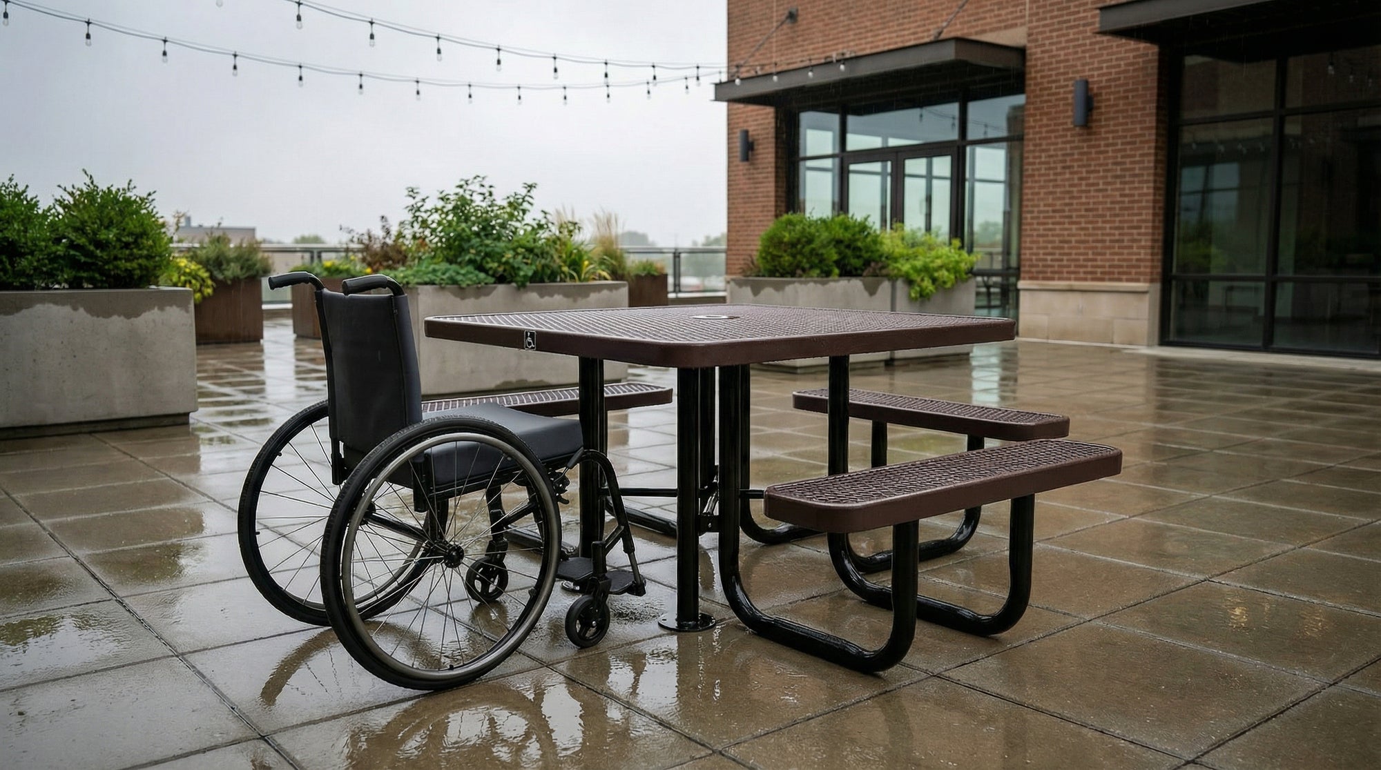 Brown square ADA accessible expanded metal picnic table with commercial steel frame and wheelchair clearance design for outdoor dining in all weather