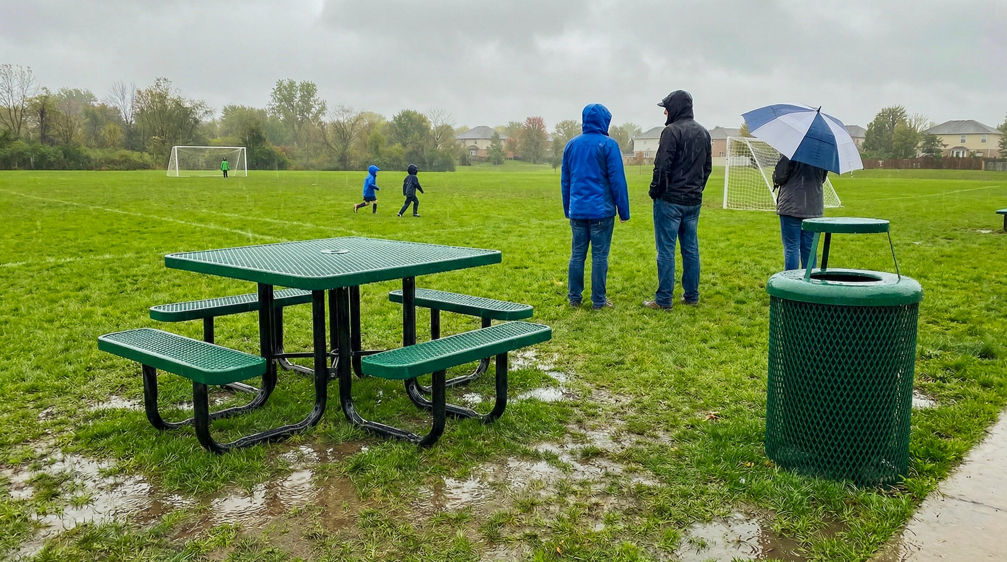 Green square expanded metal picnic table with commercial-grade steel frame and weather-resistant protective coating for outdoor seating