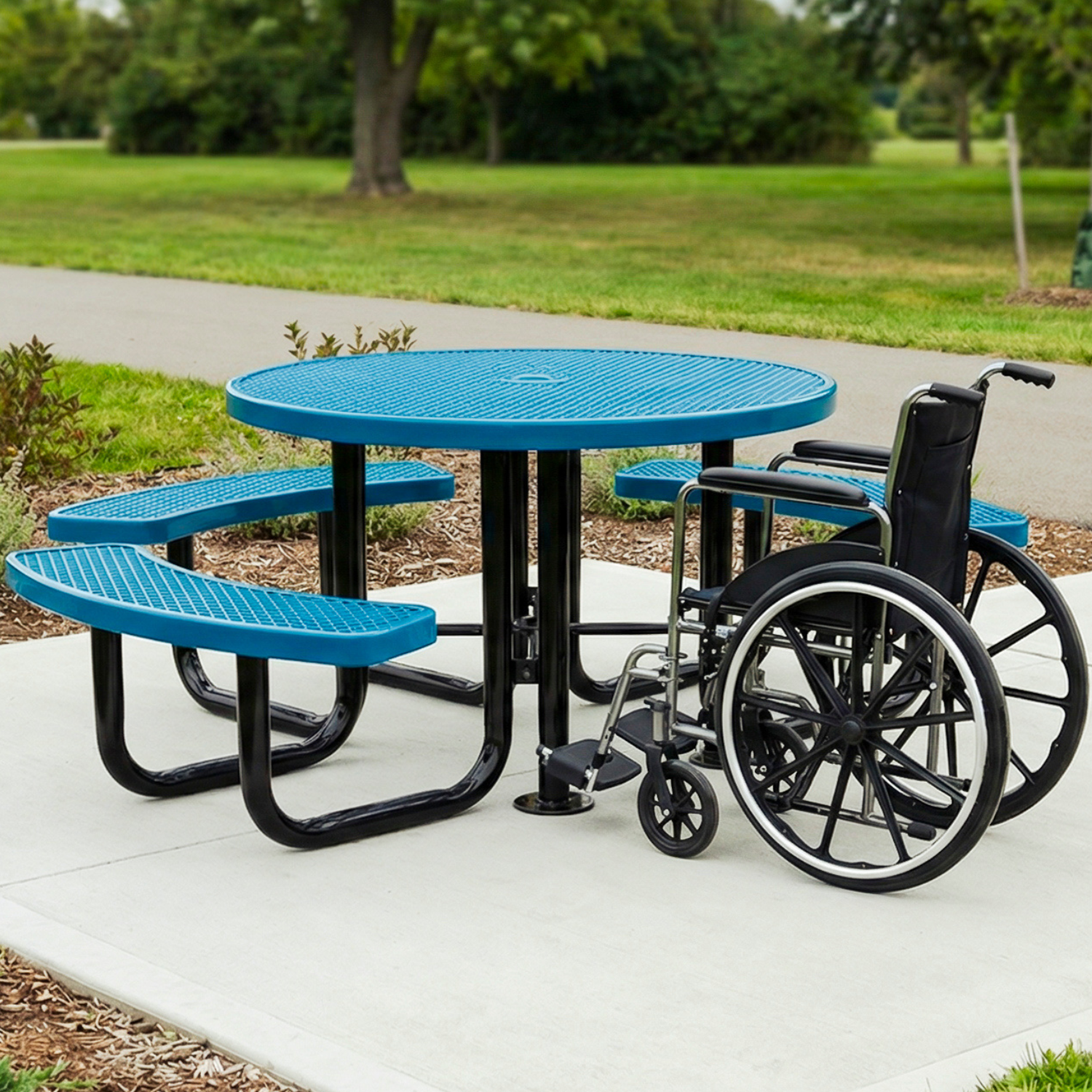 Blue picnic table with wheelchair accessibility features in a park setting