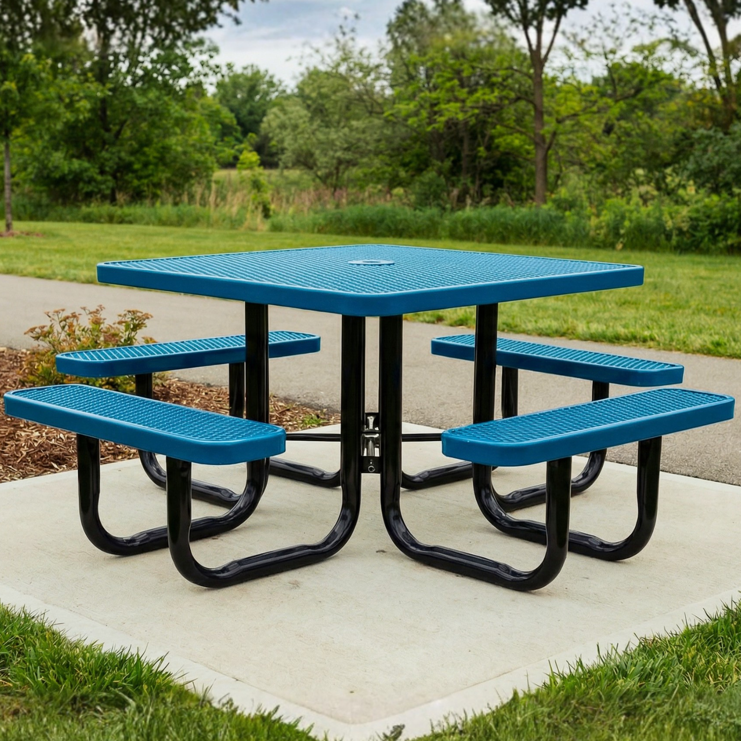 Blue square picnic table with black legs in a park setting